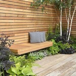 Tuininspiratie: Moderne robuuste design schutting met 70 mm brede planken.